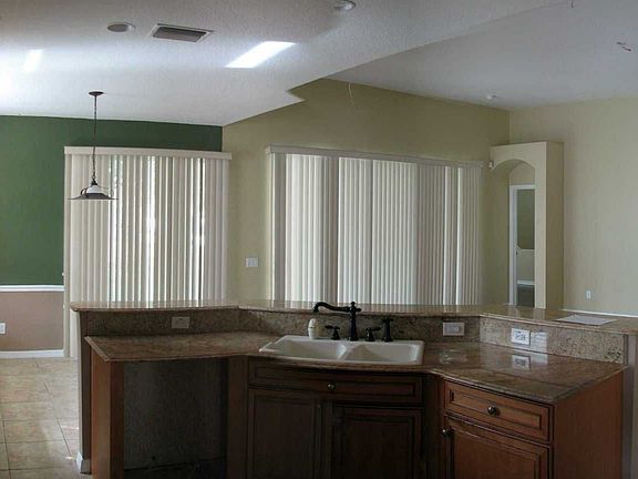 Kitchen opens to Family Room