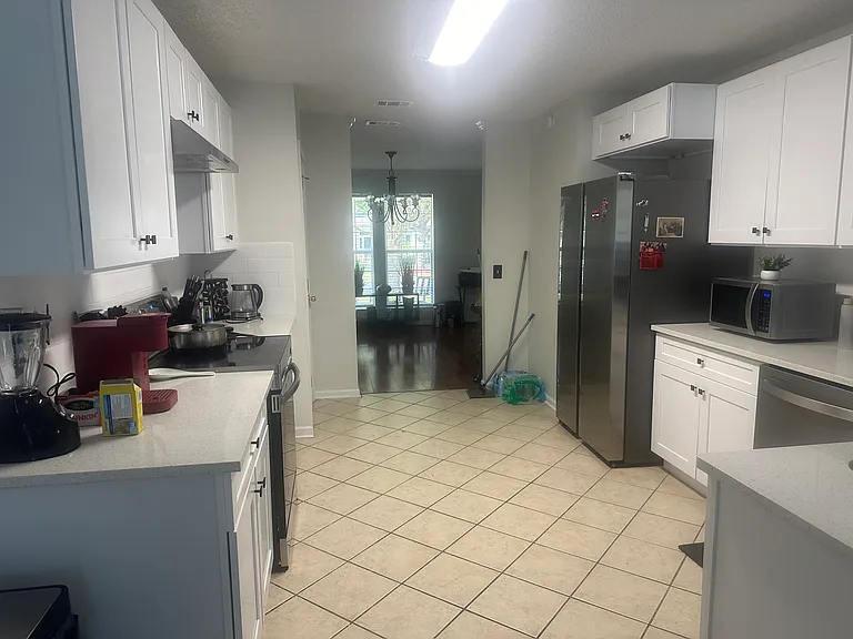 Brand new remodeled kitchen with quartz countertop and backslash, and all new appliances--new refrigerator, new range, new dishwasher