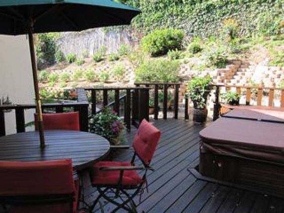 Rear yard with hot tub