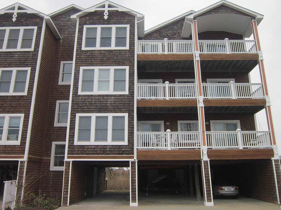 1st image of 306 N Bay Club Dr Unit 306
