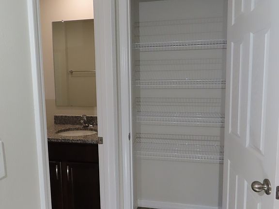 Interior of Linen closet at hall bathroom