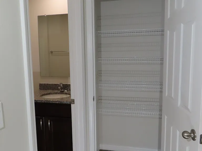 Interior of Linen closet at hall bathroom