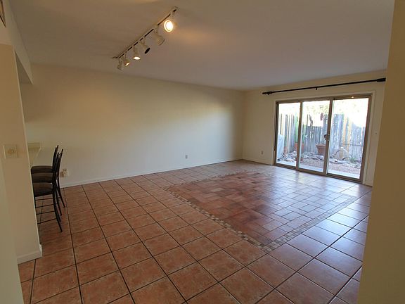 Main Room with Slider to Landscaped Patio