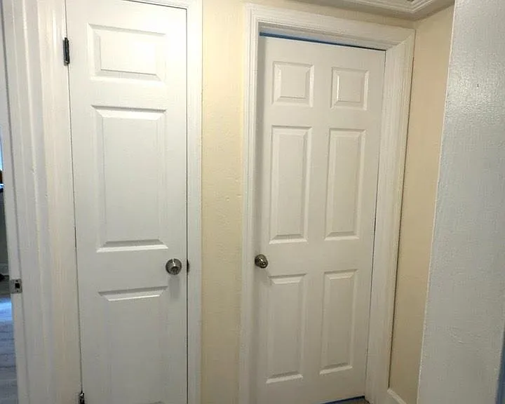 Hallway closets with plenty of storage.