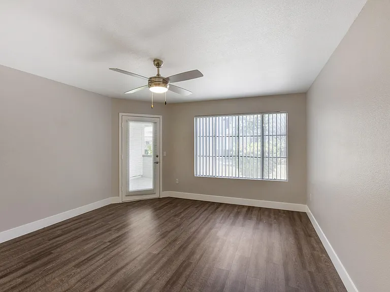 A welcoming living space with direct access to a serene patio or balcony