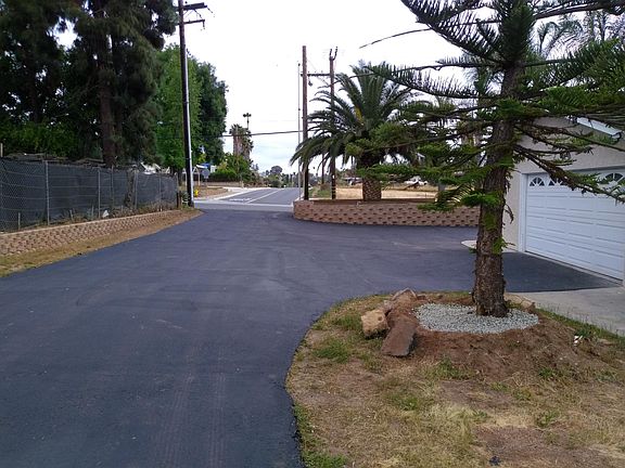 Backyard view to road. Perfect entry and exit for trailers a