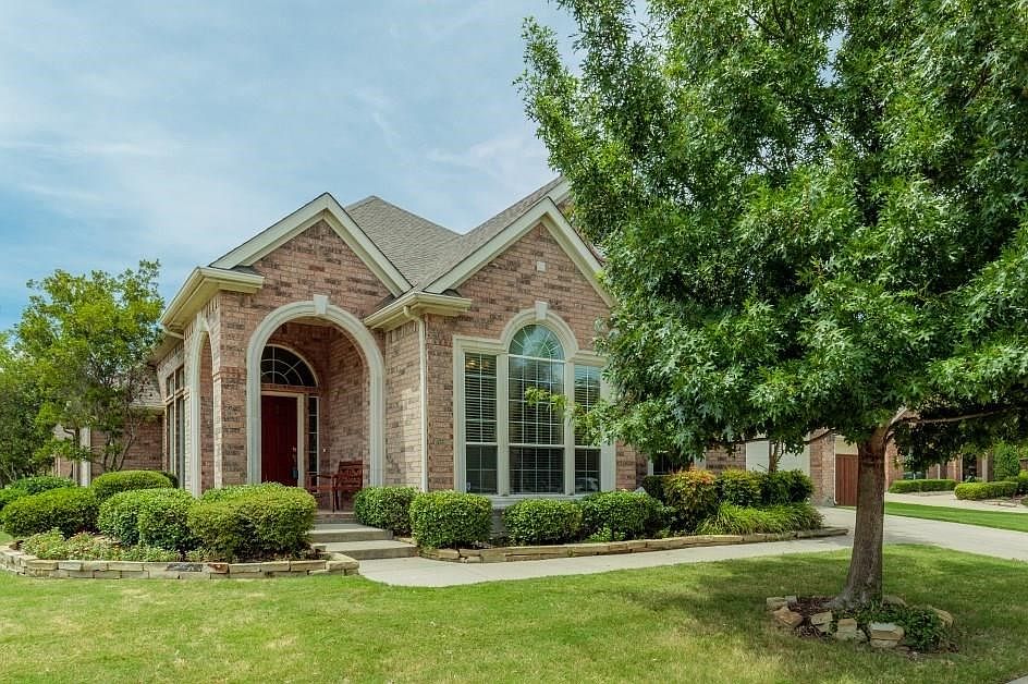 Welcoming, and relaxing, front porch comes with an open invitation to enjoy life at a slower pace.