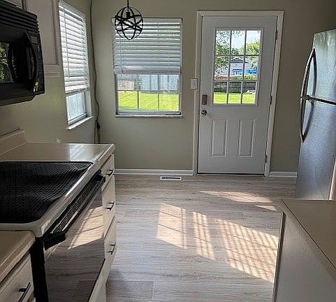 Kitchen with door to deck
