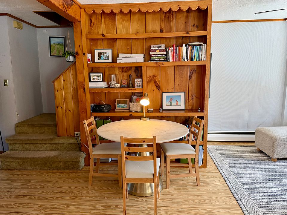 dining area with large bookshelf