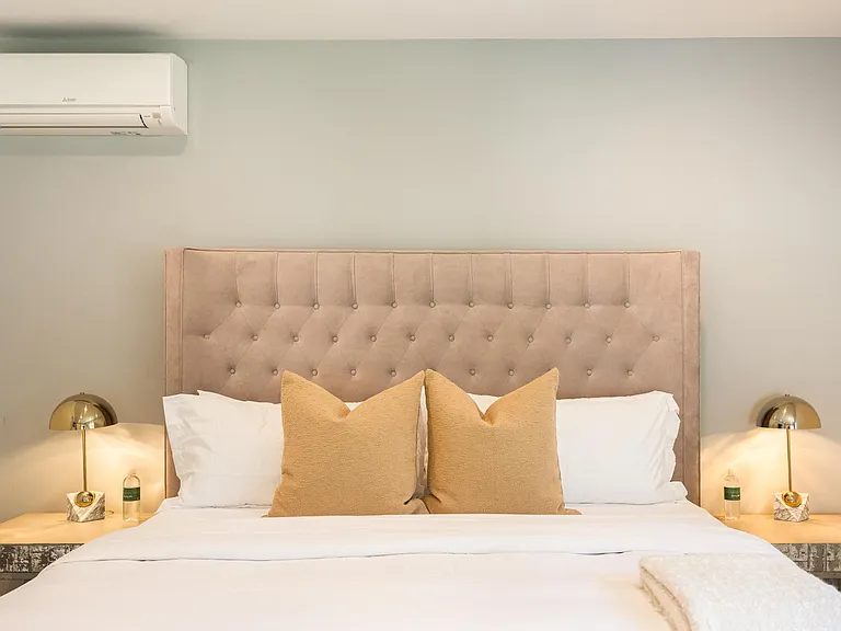 Indulge in the luxury of hotel-grade bed linen, offering crisp freshness and adorning a plush bed for your comfort.