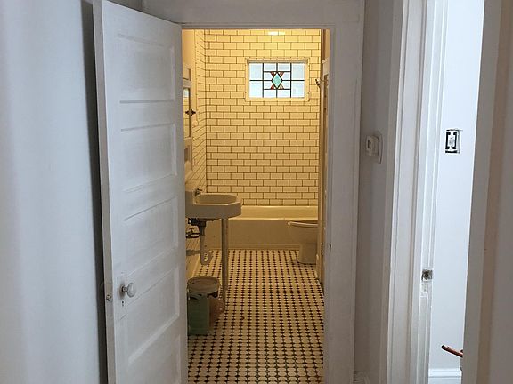 The view from the hall into the bathroom.
