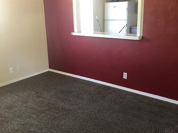 Living Room with pass through opening into kitchen.