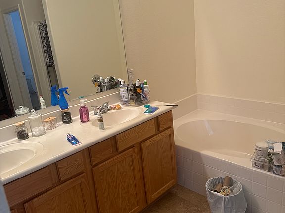 Sunken bath tub & shower in master