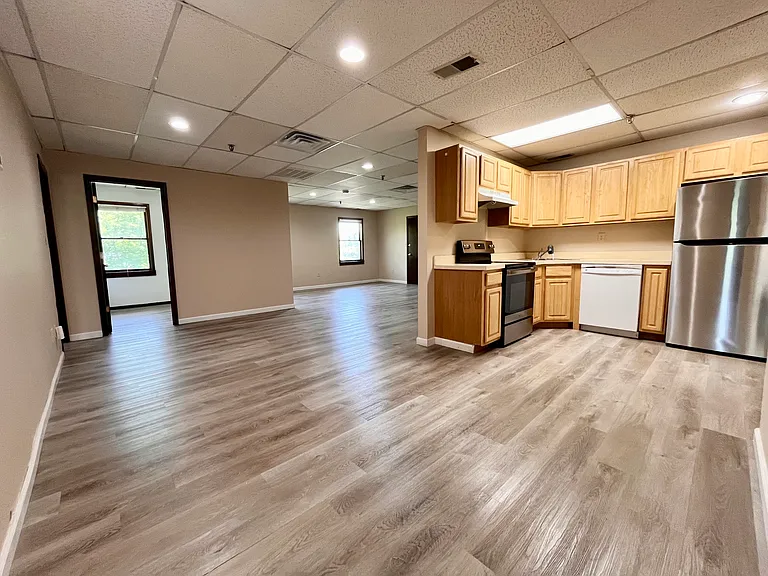 open kitchen to dining to LR and home office