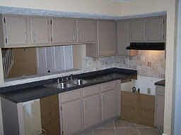 updated kitchen, new countertops and backsplash