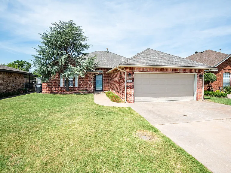 Flat driveway with 2 car garage