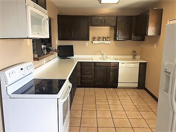 Tiled flooring and newer apppliance.