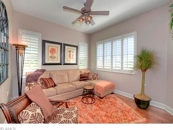 Family room with views of lake and golf.