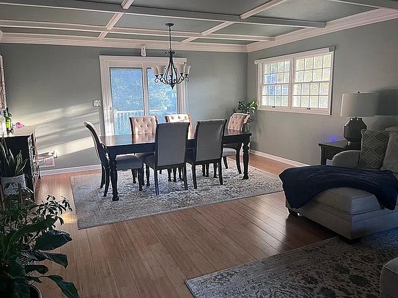 Open Concept Dining with Sliders to large deck.