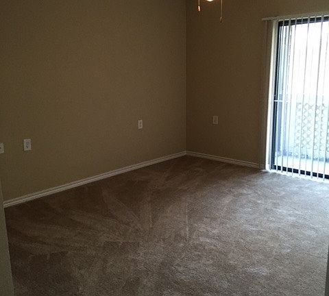 Spacious bedrooms with ceiling fans