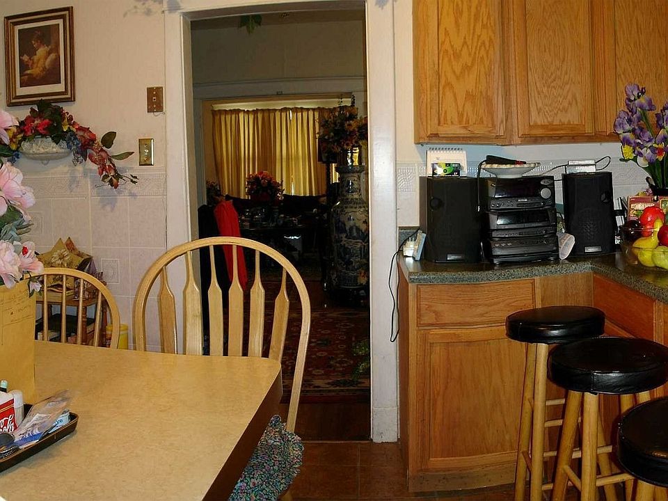 View of eat-in-kitchen looking into dining room.