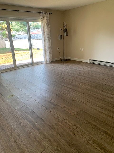 Spacious living room to deck and yard