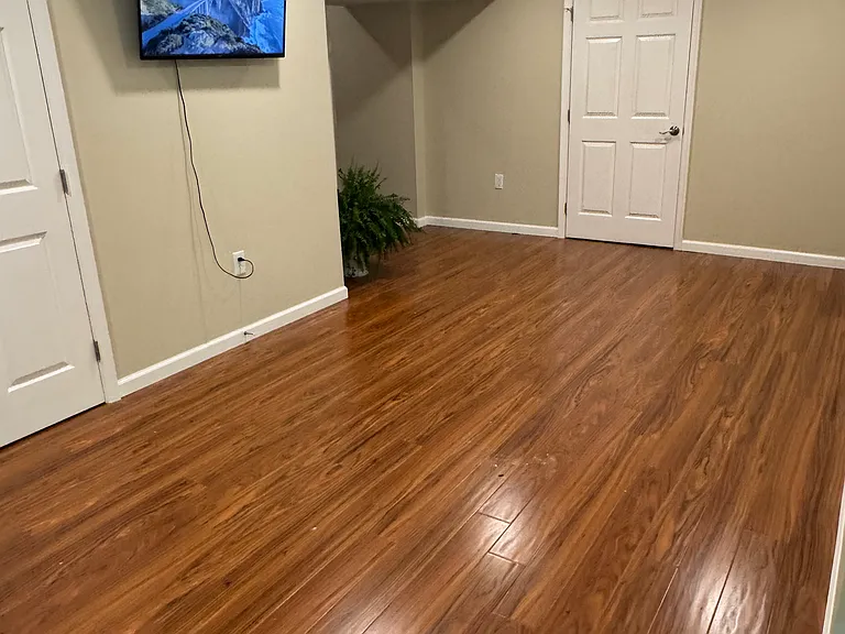 Laundry room door on left. Bedroom door on right.