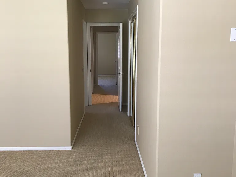Master bedroom looking into hallway