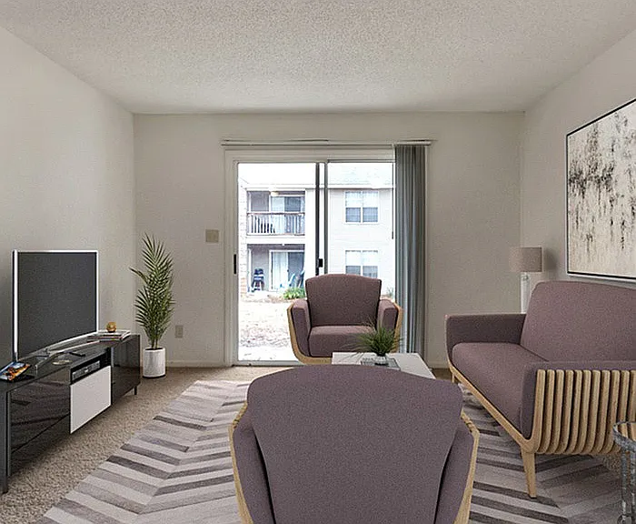 Experience comfort in this beautifully designed living room with ample natural light.