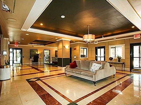 The lobby welcomes guests with a chic sense of style.