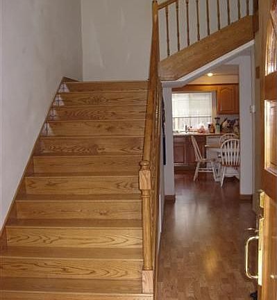 A warm welcome awaits you in this well-designed, custom-built home! 