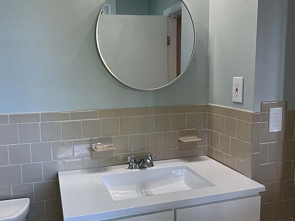 Bathroom
- New flooring
- New paint
- New lighting
- New plumbing fixtures