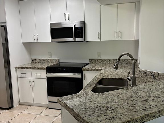 2nd image of 9033 Wiles Rd #4-101