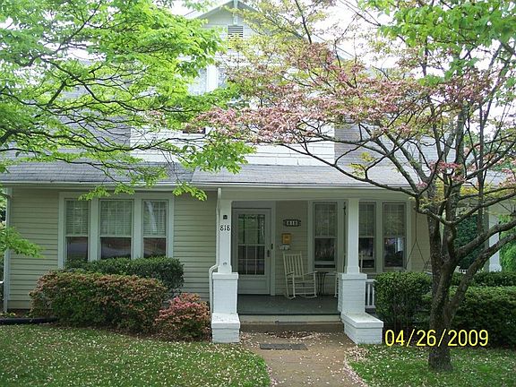 Front of Home with porch swing