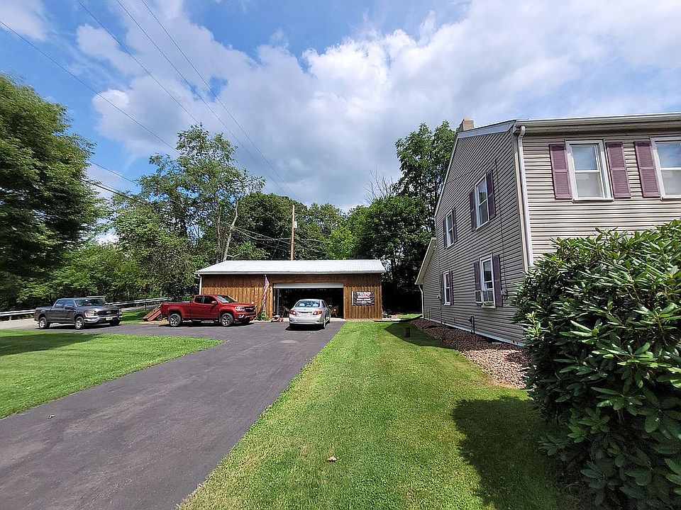 Front with garage/driveway