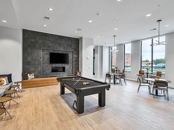 Community Lounge Featuring a Pool Table