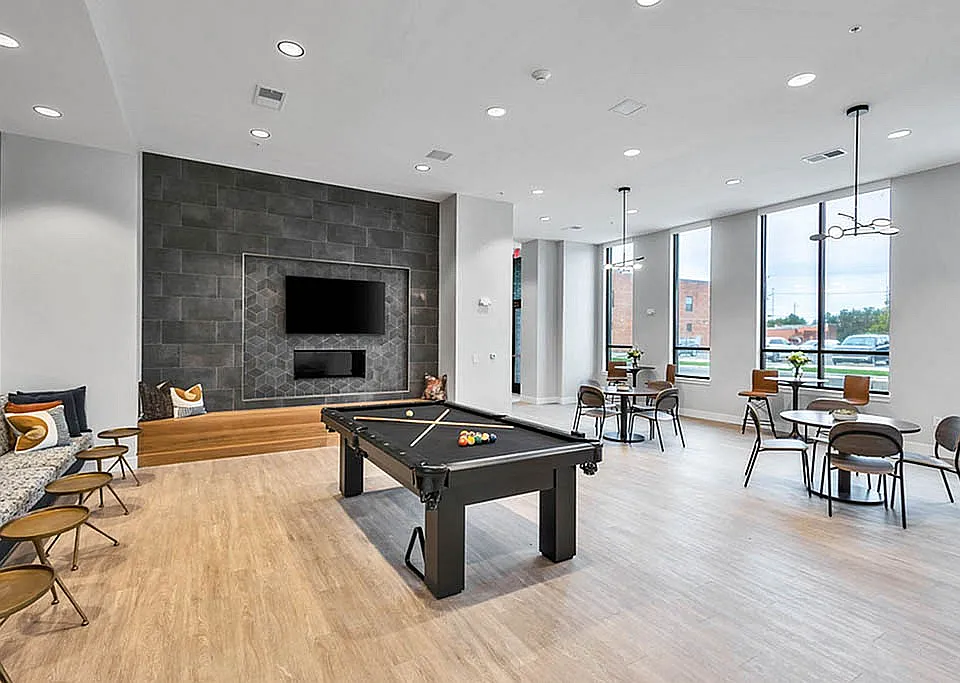 Community Lounge Featuring a Pool Table
