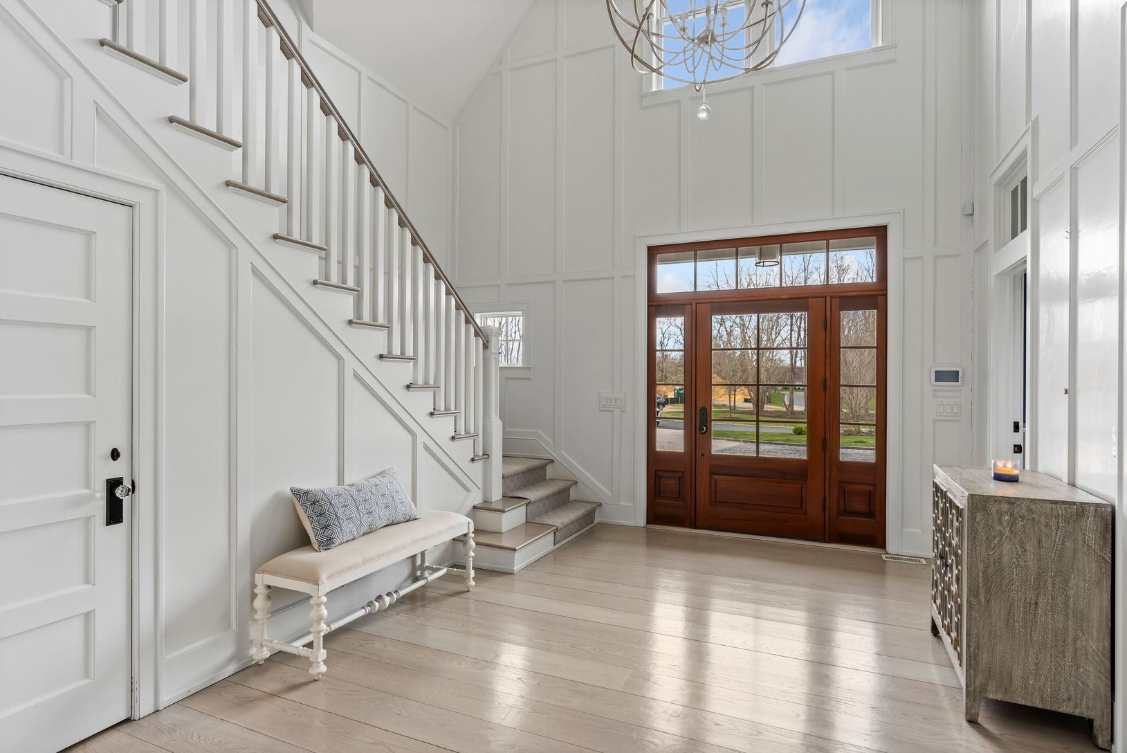  Panel walls & Crown Moldings Throughout 