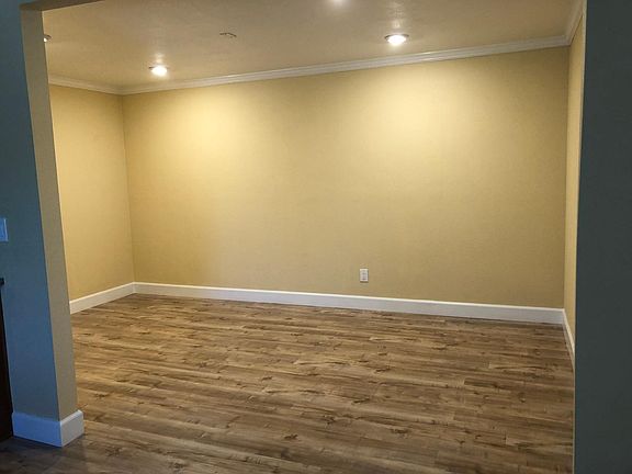 Garage converted into living area with dimmer switches