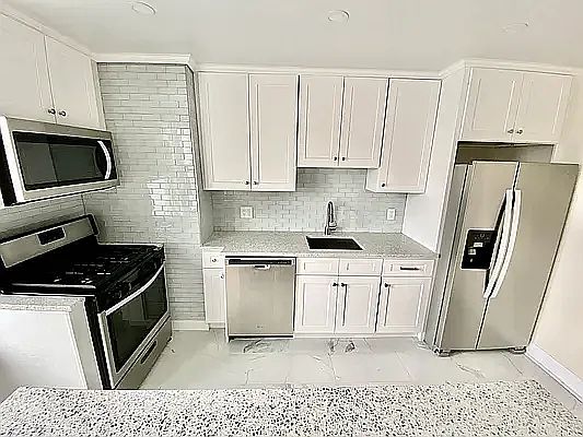 4th image of 6921 6th Ave #3F