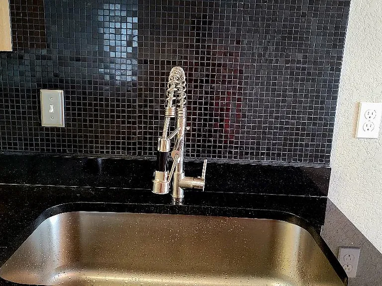 Large Restaurant Grade faucet Fixture and Deep Designer Sink