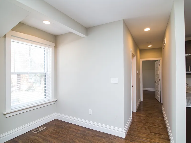 Nook off the laundry closet & kitchen, perfect for a reading corner or desk space