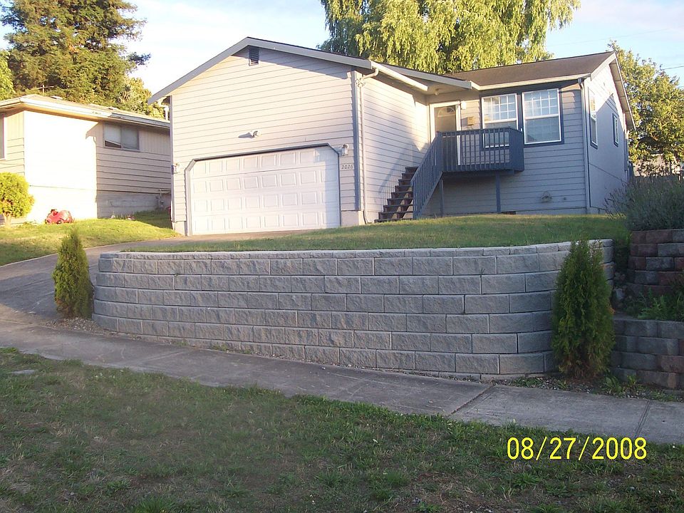 Front of home w/ new wall