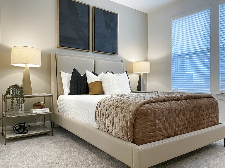 Relax and recharge in the comfort of our spacious, serene bedrooms at Latitude Apartments