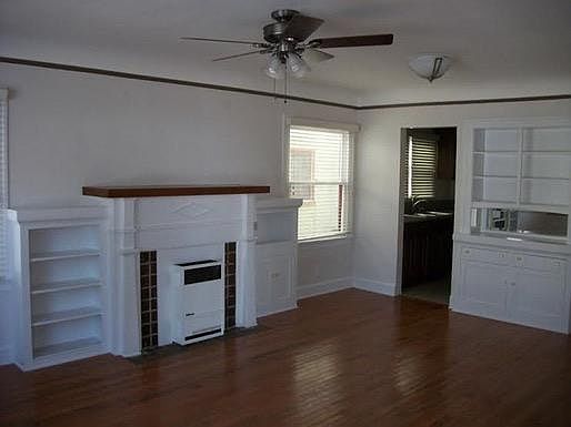 Living / dining with fireplace and lots of natural light