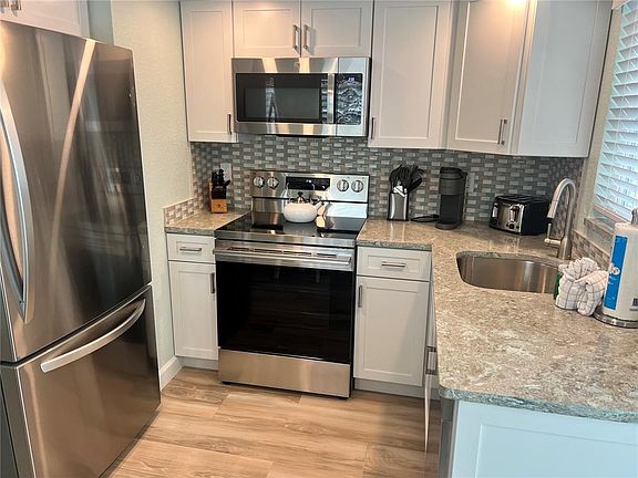 3rd image of 6154 Midnight Pass Rd Unit D-16