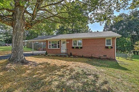 Updated brick ranch home in quiet neighborhood. Gorgeous mountain views from front yard. Note: damaged tree in front yard has been removed and a window has been added in the basement bedroom.