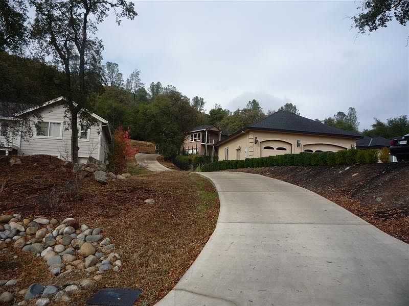 Property is at end of driveway on right.