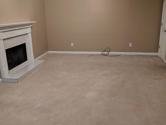 Living Room with wood burning fireplace