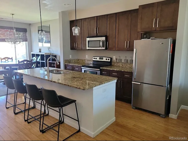 5484 Monaco St — Photo 2